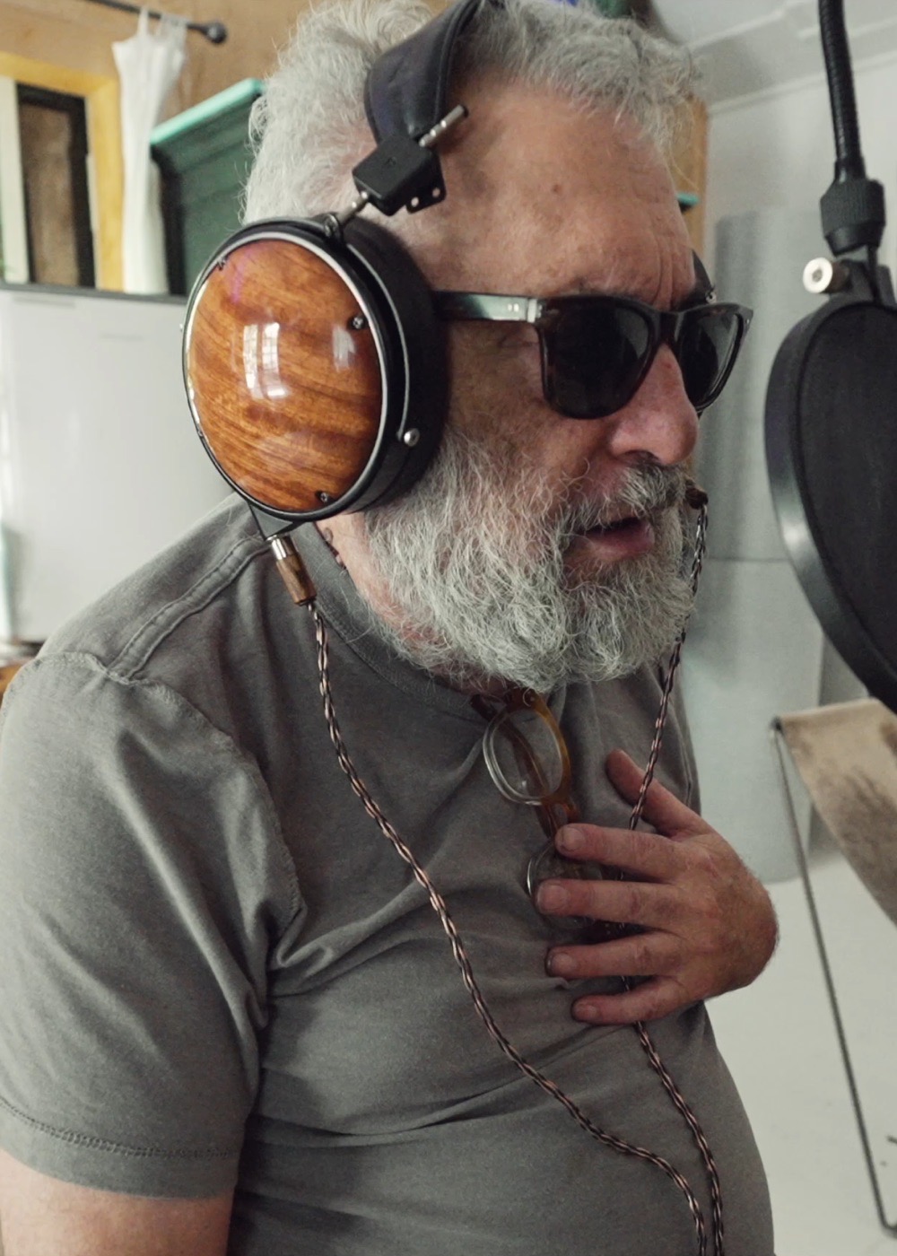 Acidic Rabbi in the studio, wearing headphones