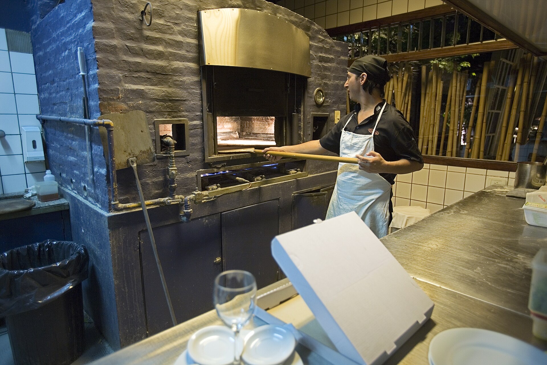 A pizza oven in a restaurant kitchen