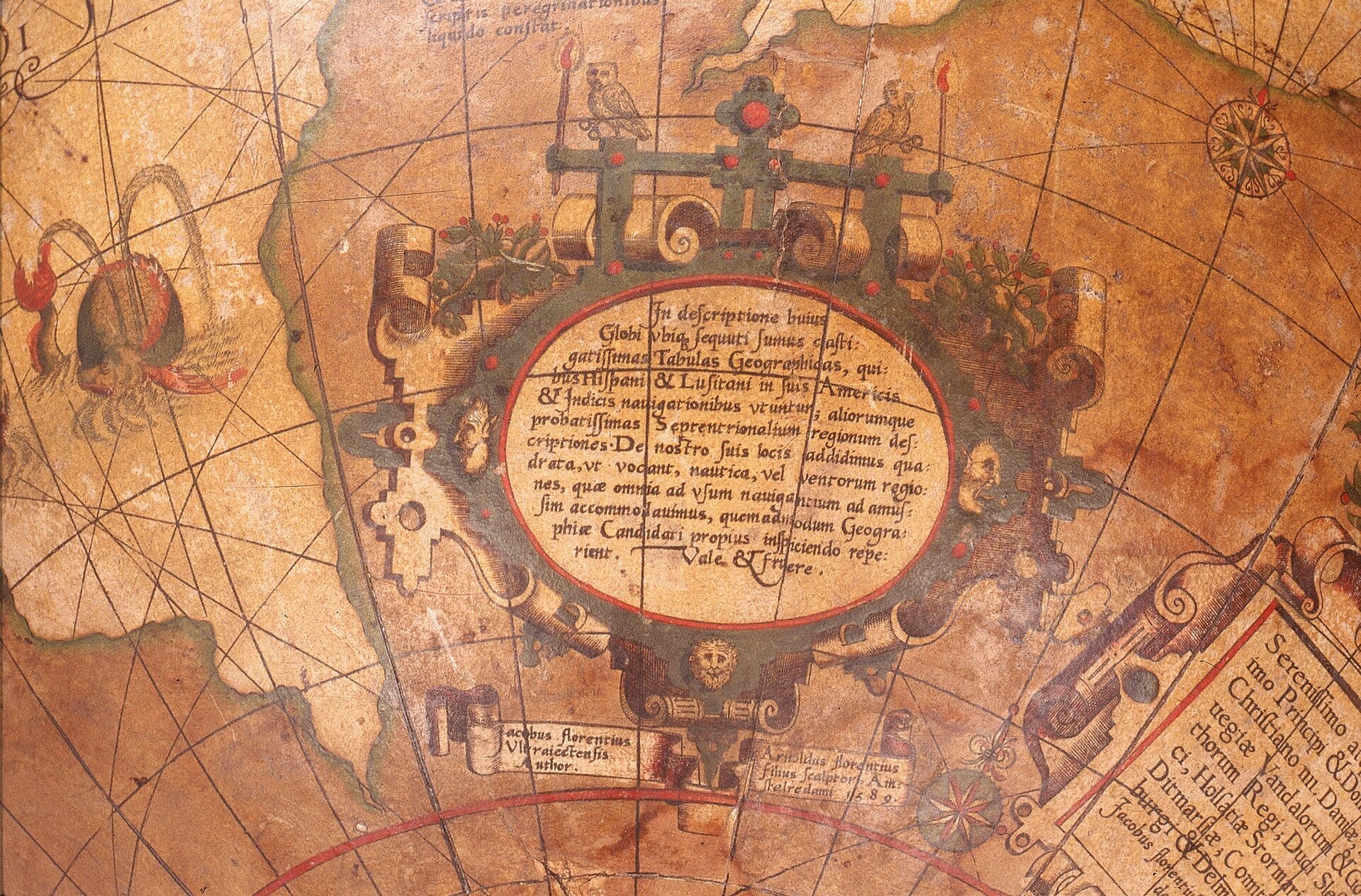 Detail of an old terrestrial globe with a map and a cartouche